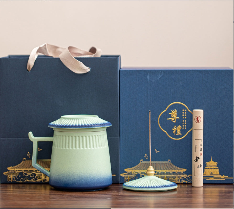 Experience tranquility and elegance with our Chinese Ceramic Tea Cup with Lid and Incense Stick. Crafted from high-quality ceramic, this beautifully designed with forbidden city building structure tea cup enhances your tea-drinking experience while keeping your beverage warm. The accompanying incense stick adds a soothing aroma, creating the perfect atmosphere for relaxation and mindfulness.