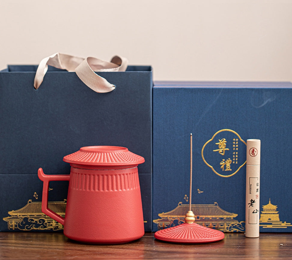 Experience tranquility and elegance with our Chinese Ceramic Tea Cup with Lid and Incense Stick. Crafted from high-quality ceramic, this beautifully designed with forbidden city building structure tea cup enhances your tea-drinking experience while keeping your beverage warm. The accompanying incense stick adds a soothing aroma, creating the perfect atmosphere for relaxation and mindfulness.