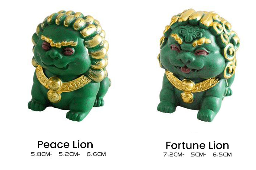 Comparison image of the Peace Lion (5.8CM × 5.2CM × 6.6CM) and the Fortune Lion (7.2CM × 5CM × 6.5CM), both green mini stone lion ornaments with golden accents, symbolizing protection and prosperity.