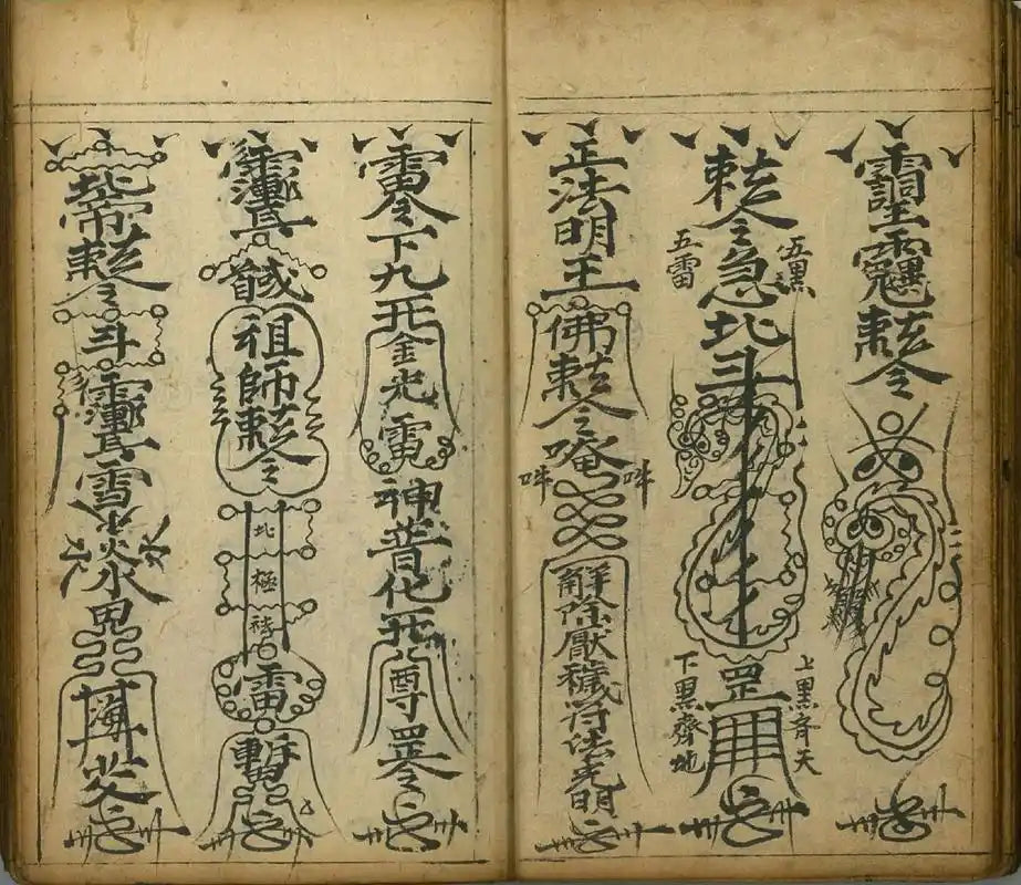 Ancient Taoist Fulu scriptures featuring intricate handwritten talisman designs and traditional Chinese calligraphy for spiritual protection and rituals.