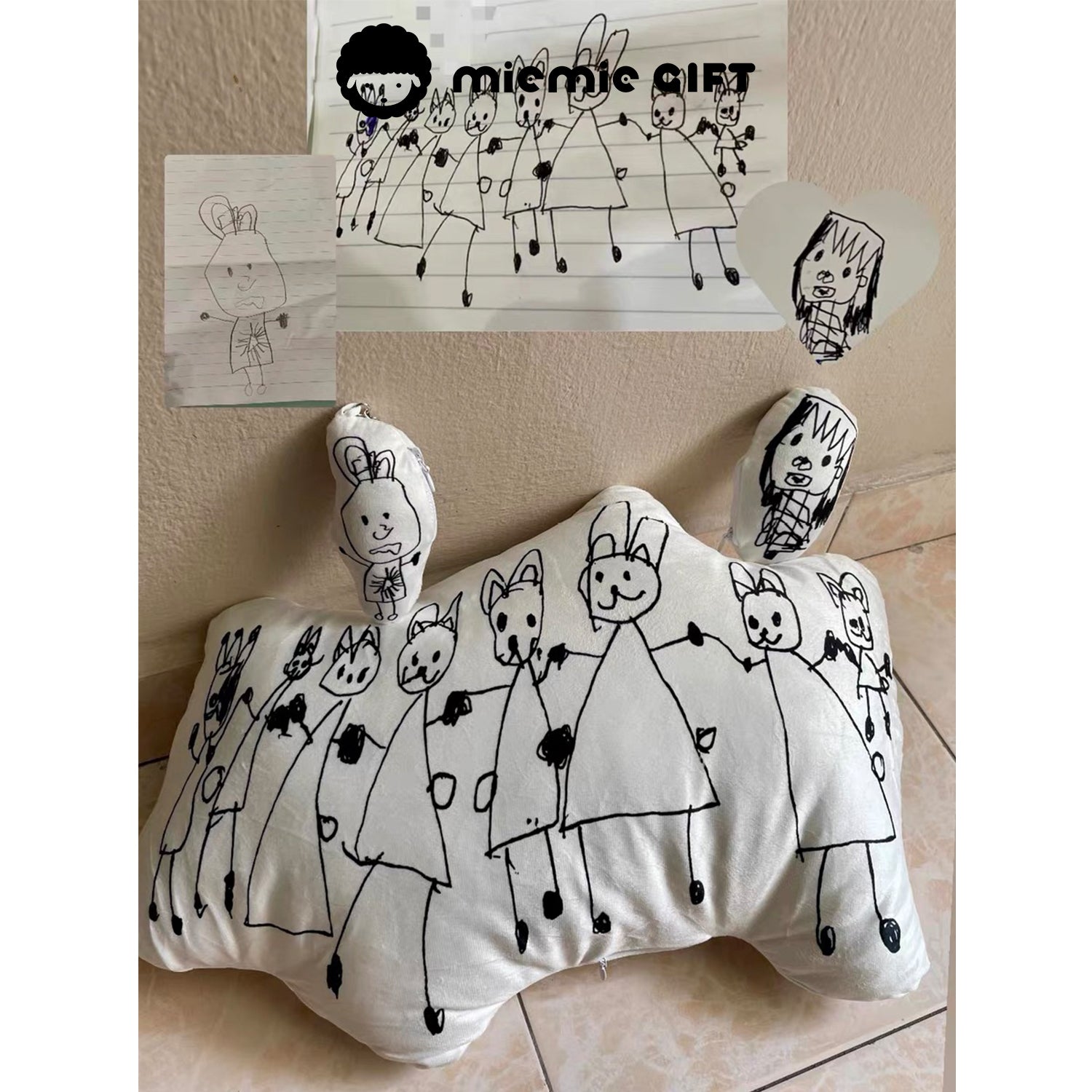 Custom pillow made from a child’s group drawing, showcasing adorable hand-drawn characters transformed into a unique and sentimental keepsake.