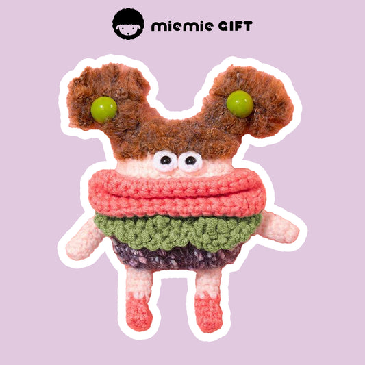 Handmade crochet knitted AirPods case with a playful green button hairstyle, sausage-shaped mouth, and a colorful gradient skirt, providing full protection for AirPods 1/2/3/Pro.