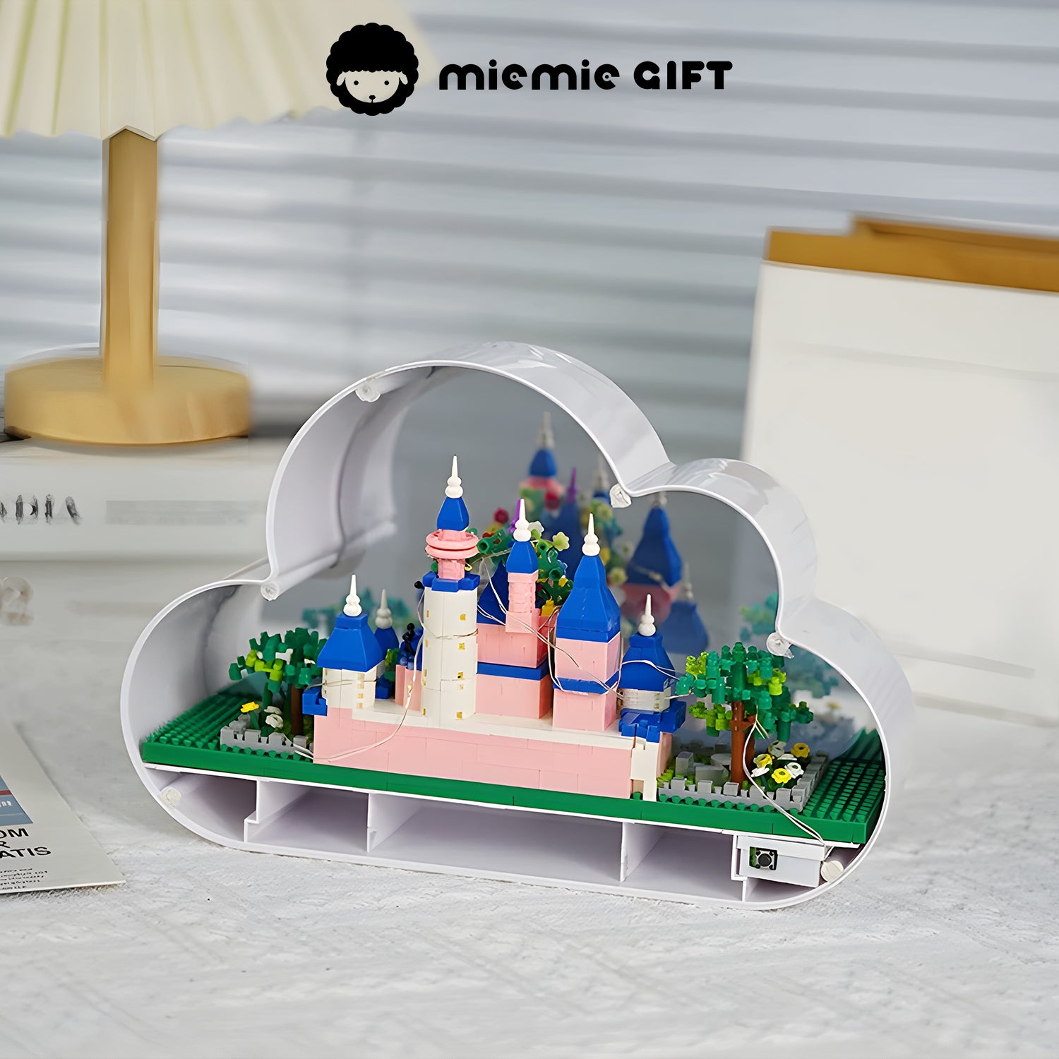 A close-up of the DIY cloud-shaped nightlight showcasing a beautifully crafted castle made of building blocks.