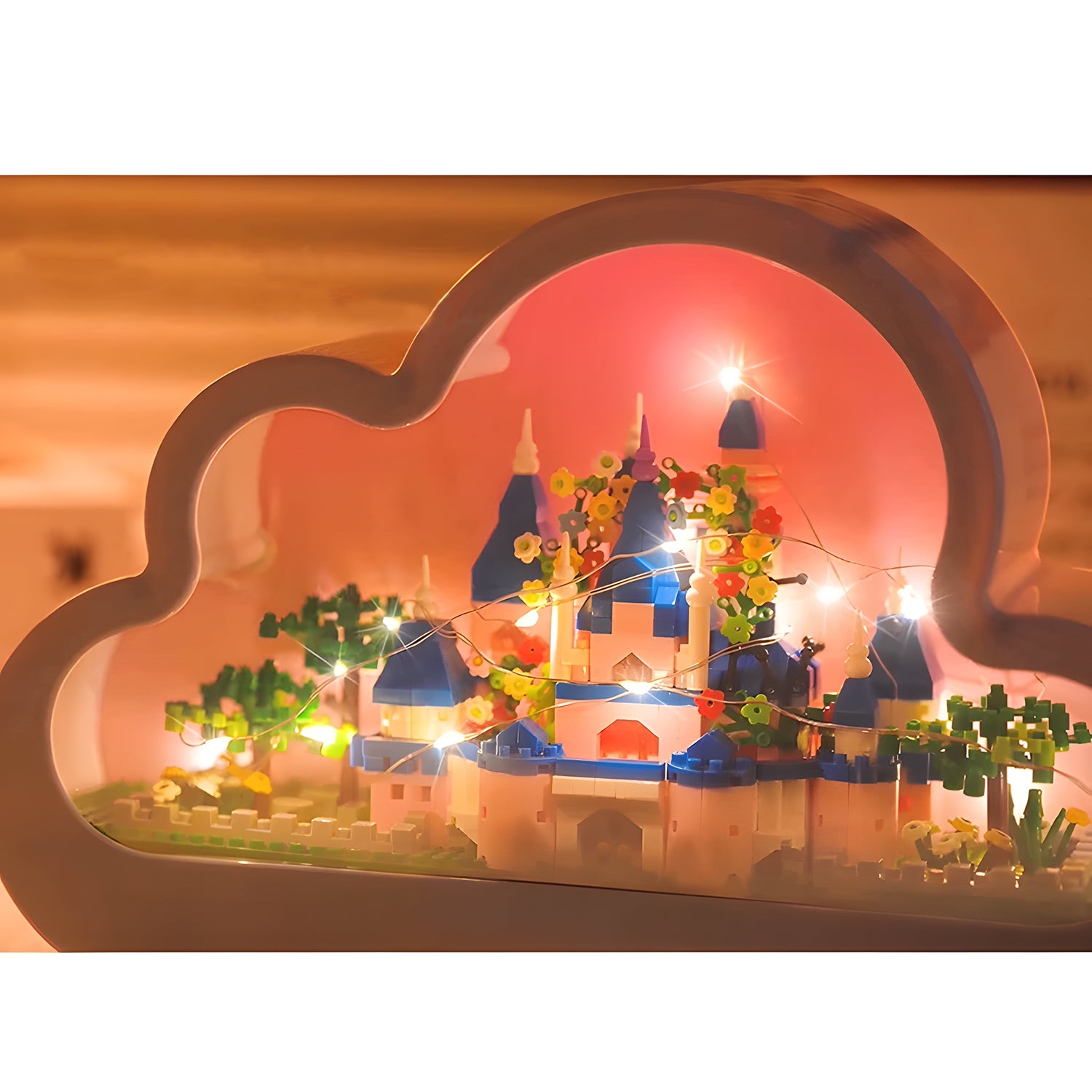 A dreamy cloud-shaped DIY nightlight with a glowing castle inside, softly illuminated with warm lights, creating a magical ambiance.