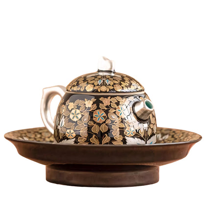 Side view of the Golden Branches & Jade Leaves Gilded Silver Teapot on a matching tray, featuring elegant gold floral patterns and a sophisticated design, perfect for tea ceremonies.