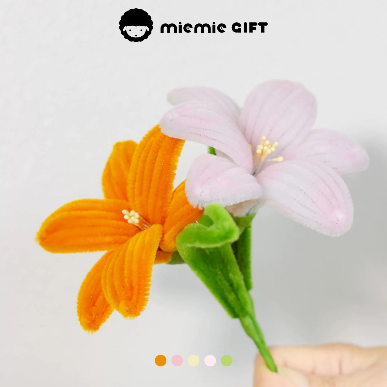 Elegant orange and white lily flowers crafted with pipe cleaners by MieMie Gift, showcasing a delicate and graceful design for DIY projects.