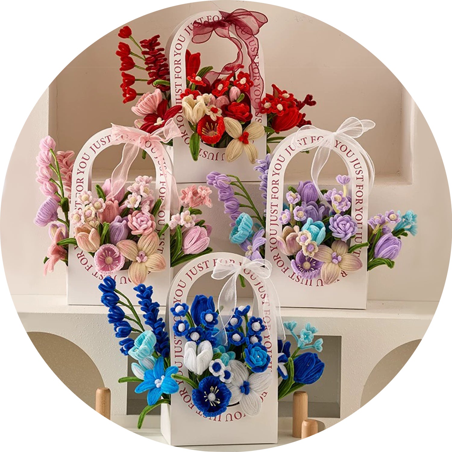 A collection of MieMie Gift DIY Flower Baskets in various colors, including red, blue, purple, and pink, featuring handmade pipe cleaner flowers.