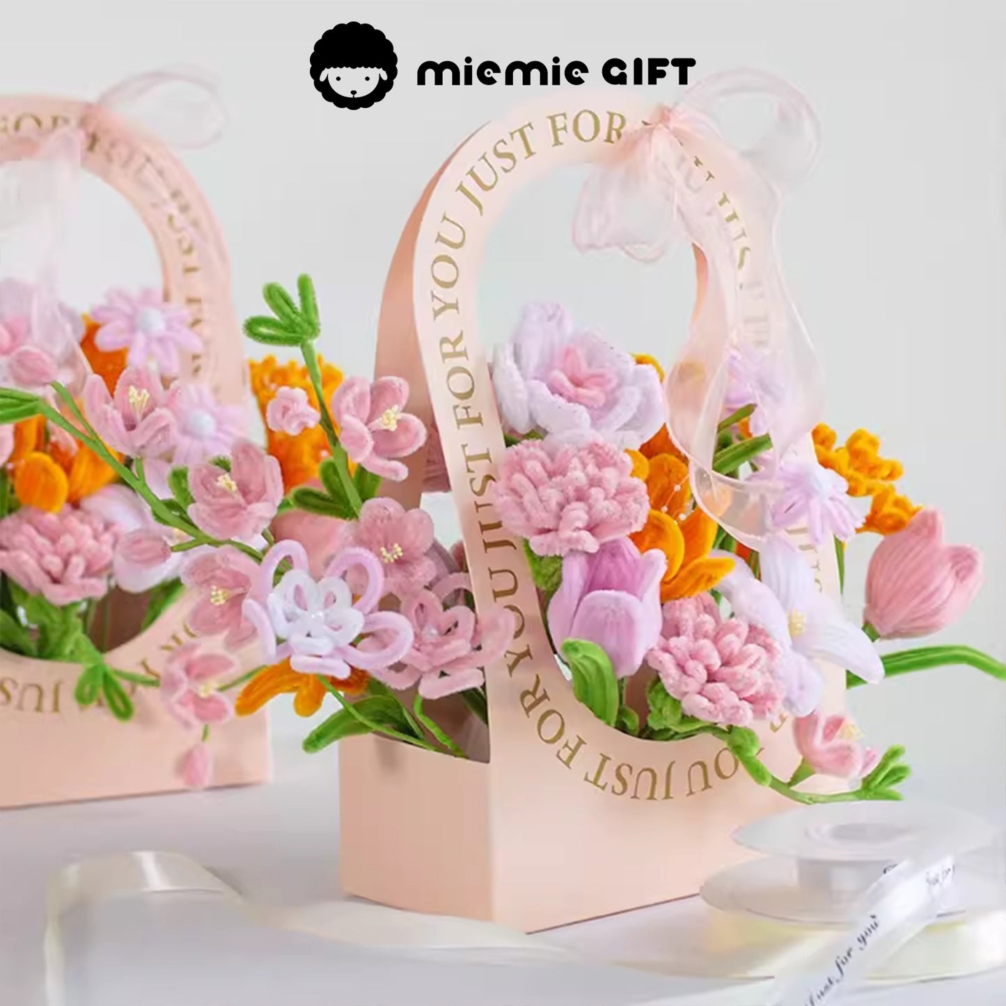 Two MieMie Gift DIY Flower Baskets with handmade pipe cleaner flowers in pink and orange tones, ideal for gifts or elegant home decor.

