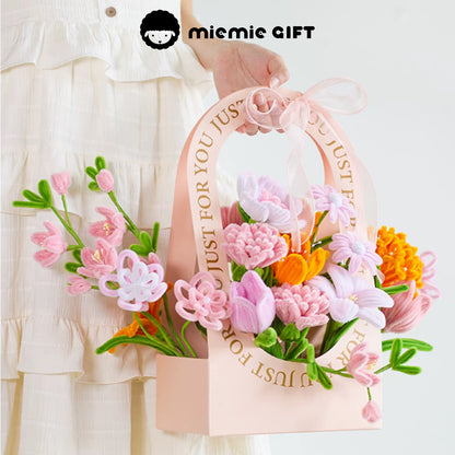 MieMie Gift DIY Flower Basket with soft pink and orange handmade pipe cleaner flowers, elegantly held, perfect for gifting or home decoration.