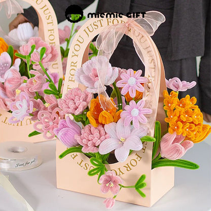 Pastoral Bliss Basket by MieMie Gift with DIY pipe cleaner flowers in soft pink and orange hues, perfect for home decor or as a thoughtful gift.