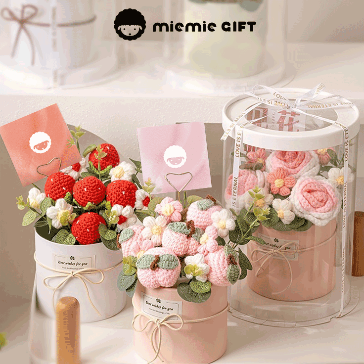  bouquet of hand-knitted strawberries peach blossom and rose, a symbol of love and care, elegantly packed in a white box with a clear window and ribbon handle