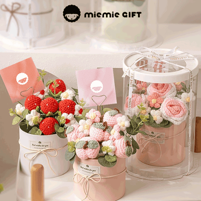  bouquet of hand-knitted strawberries peach blossom and rose, a symbol of love and care, elegantly packed in a white box with a clear window and ribbon handle