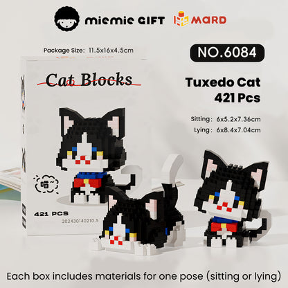 Miemie Gift's Tuxedo Cat brick toy with 421 pieces. Create your favorite pose—sitting (6x5.2x7.36cm) or lying (6x8.4x7.04cm)—with this charming DIY head-shaking design. Packaged in a sleek 11.5x16x4.5cm box, it's perfect for cat lovers and DIY enthusiasts.