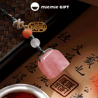 Luxury pink quartz stamp pendant featuring artisan craftsmanship