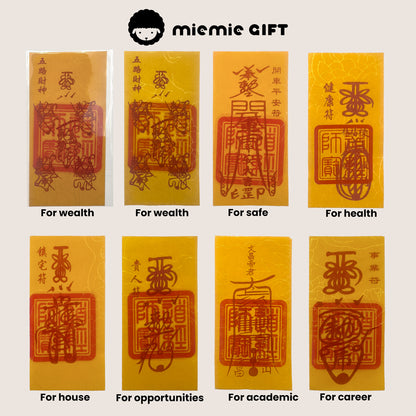 An assortment of Taoist Fulu talismans handcrafted by MieMie Gift, featuring designs for wealth, safety, health, house protection, opportunities, academics, and career growth. Each talisman is made with traditional methods using cinnabar ink on yellow paper.