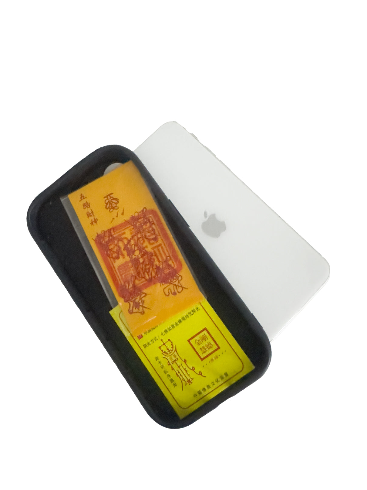 A Taoist Fulu Talisman carefully placed inside a phone case, demonstrating a modern and convenient way to carry spiritual protection with you.