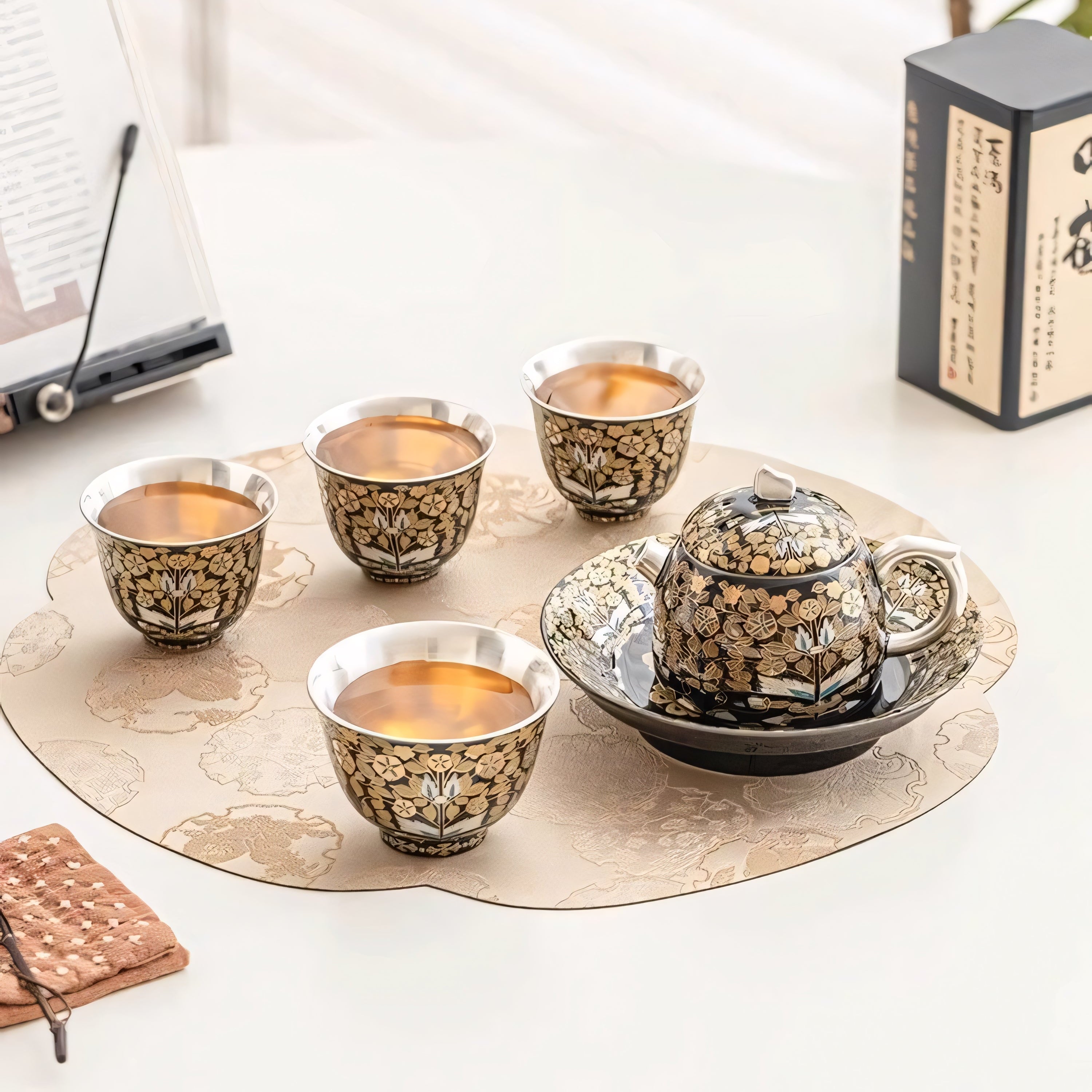 A traditional Chinese tea set with beautifully designed cups and a teapot, elegantly displayed with tea and a decorative tea mat, creating a serene and cultural atmosphere.

